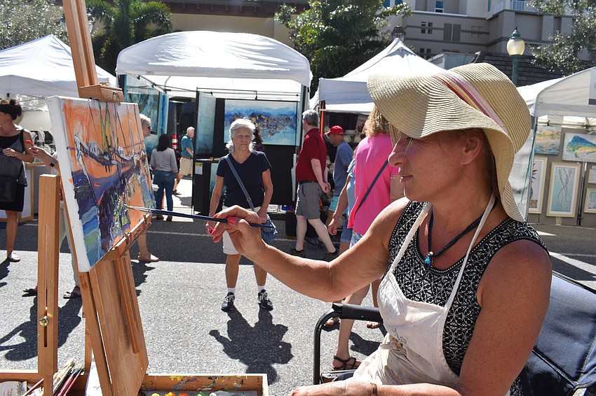 Dawn Normali paints a picture live and in person.