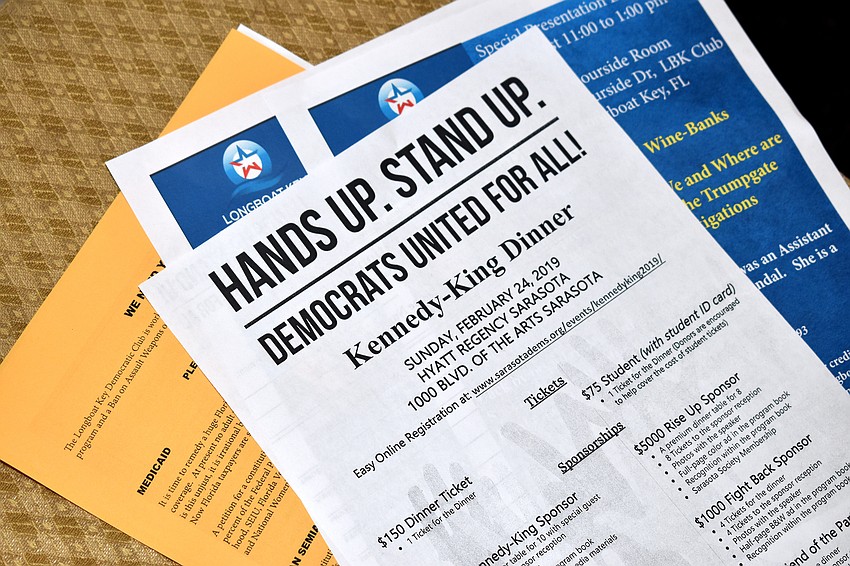 Flyers for upcoming events were at each table setting.