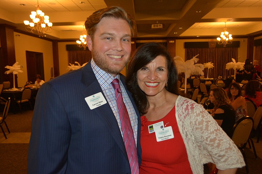 Lakewood Ranch Community Fund President Garrett Shinn visits with event co-chair Violeta Huesman.