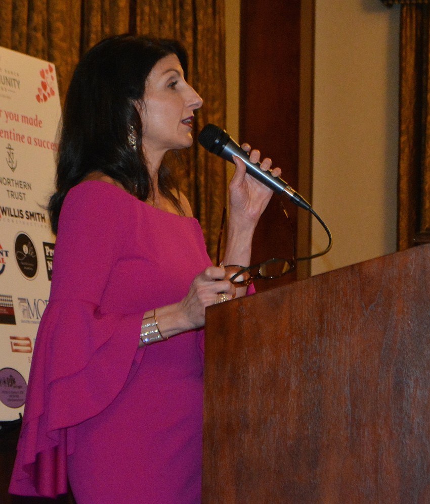 The Lake Club's Barbara Najmy addresses the crowd and talks about the importance of the giving circles,