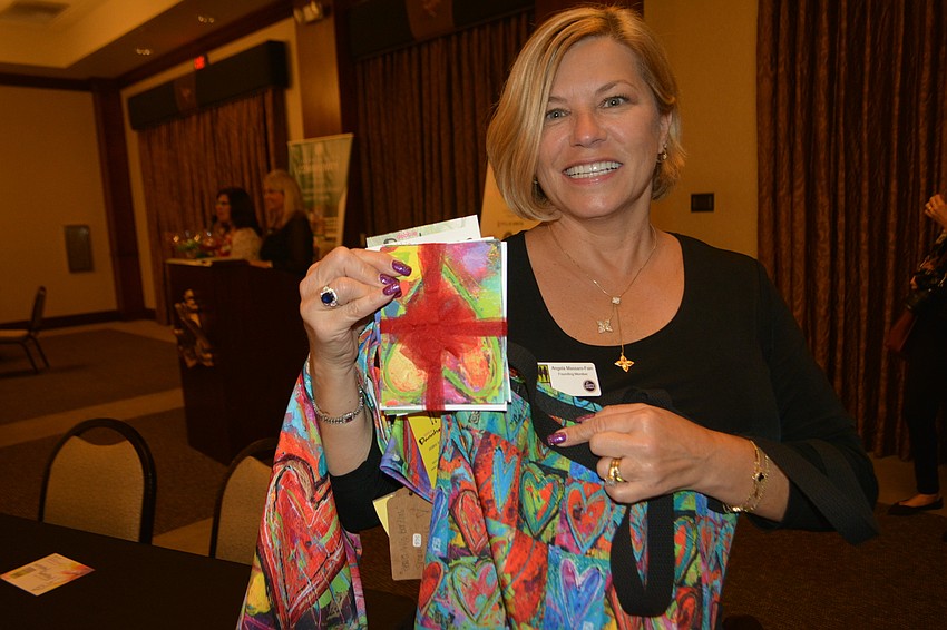 Angela Massaro-Fain, who founded Sisterhood for Good, the first women's giving circle in Lakewood Ranch, in 2011, had a score in the raffle.