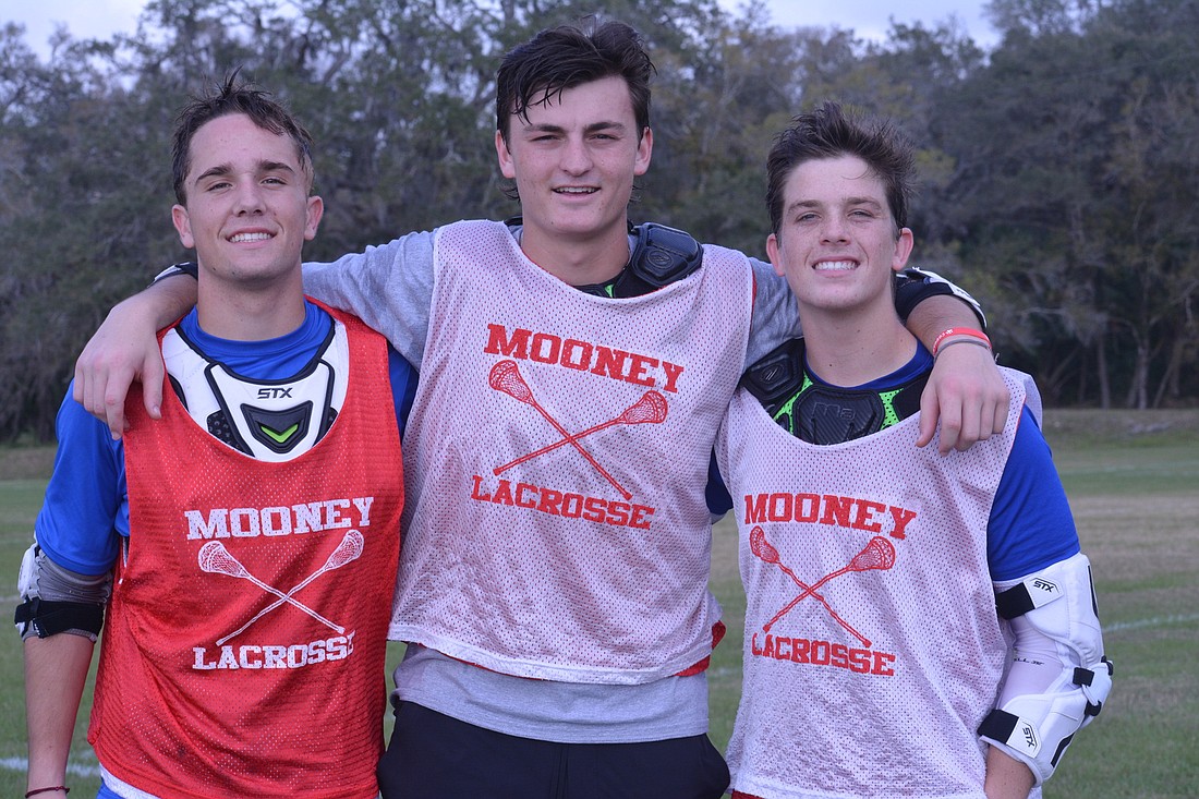 Cardinal Mooney High senior boys lacrosse captains Alec Frank, Ryan Katchen and MJ McMahon.