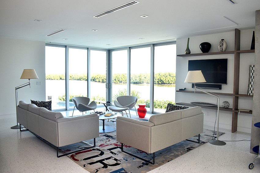 Most of the home decor is white with a few colorful accents spread about.