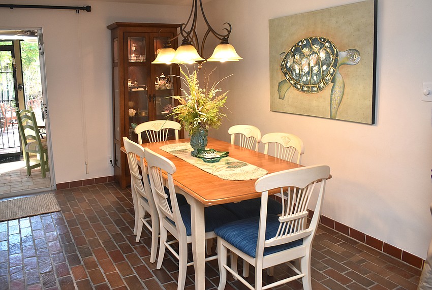 The dining room walls were recently redone with Venetian plaster.