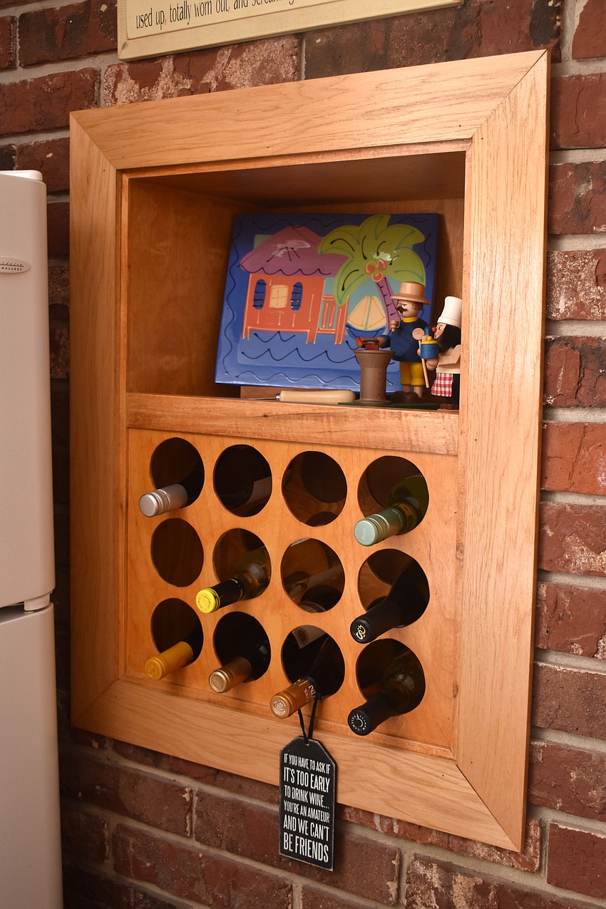 Luke’s late husband made this wine rack out of an old oven.