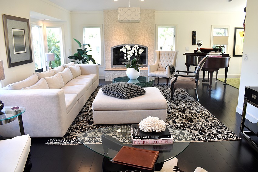 The living room is the first room up the stairs.