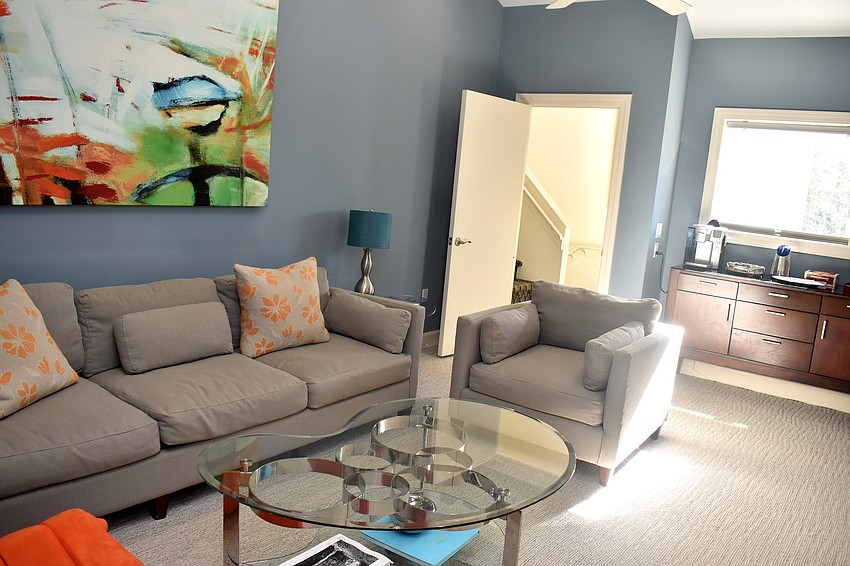 On the middle floor of the house, is a living room area that guests can use when they visit.