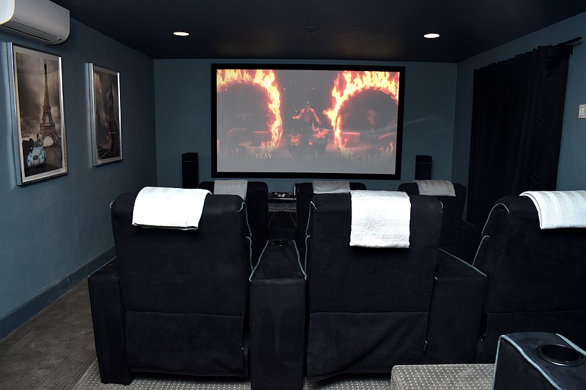 Heer and Benioni made a downstairs room into a movie theater.