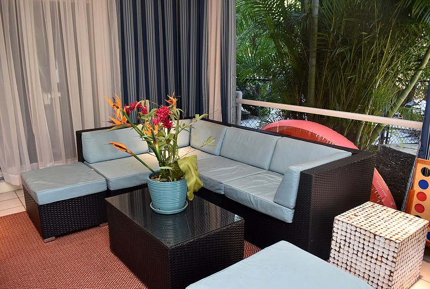 A cabana-like room is attached to the basement and leads out to the pool deck.