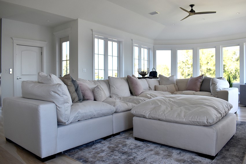 On the top floor, a second living area is open for entertaining or for guests to use.