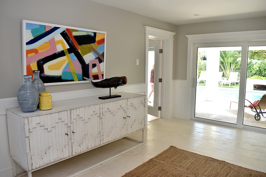 The bottom floor of the house offers direct access to the pool deck.