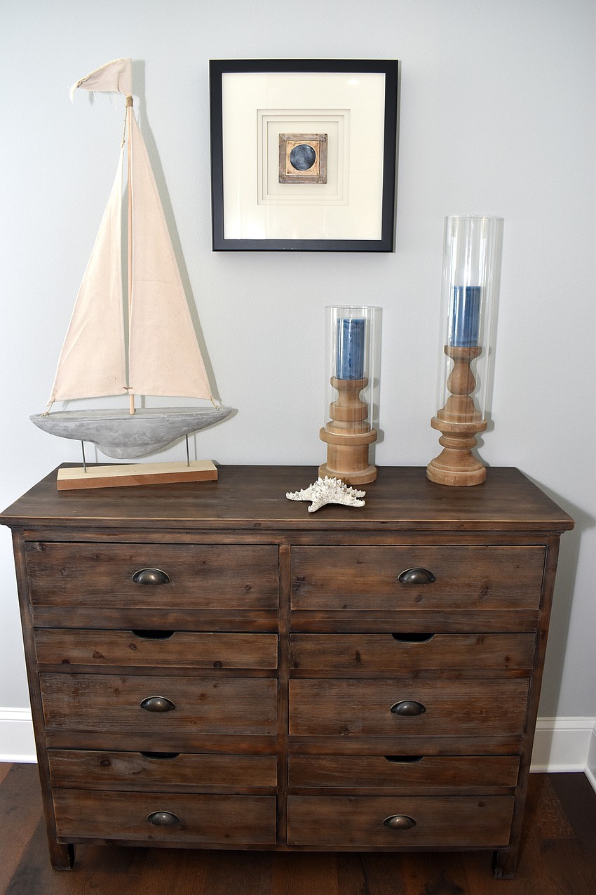 Coastal decor accents the bedrooms.