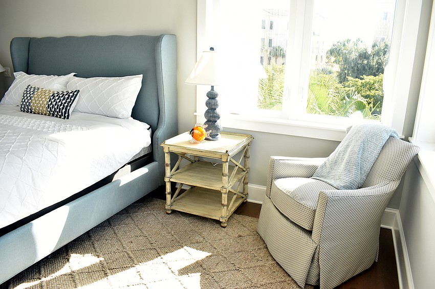 Shades of blue and tan are scattered throughout the house.