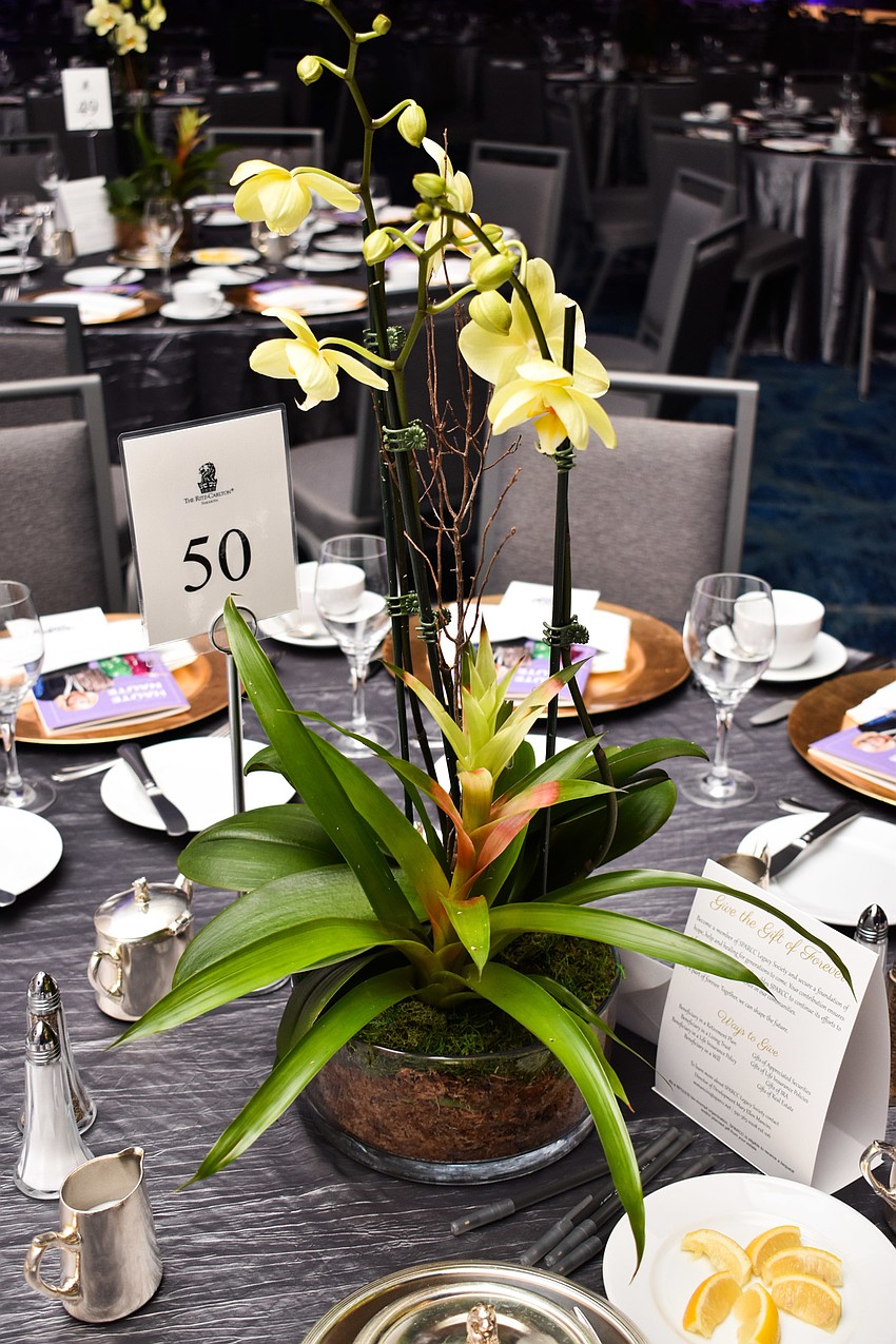 Guests could purchase the orchid centerpieces for $30 each.