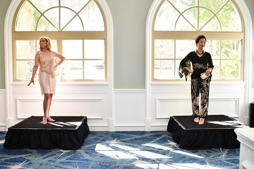 Michelle Crabtree and Linda Patzman stood still as guests walked in.