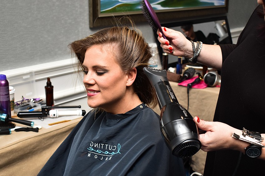 Beth Jacobson gets her hair done for the show.