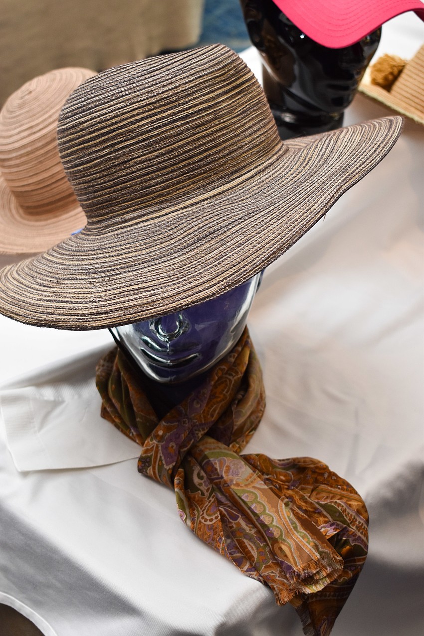 A hat table had many hats to choose from.
