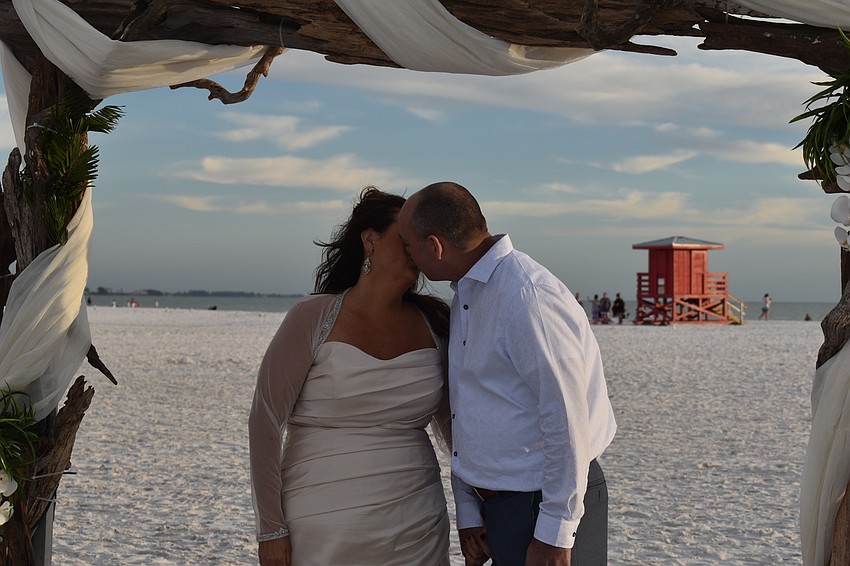 Rachel and Bill Hall have been married 4 years, but are redoing their wedding pictures because it was raining on their wedding day.