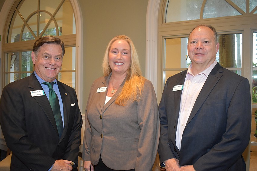 CenterState Bank's Greg Hallam, Gulfside Bank's Tracy Wolfe and CenterState Bank's David Boehm