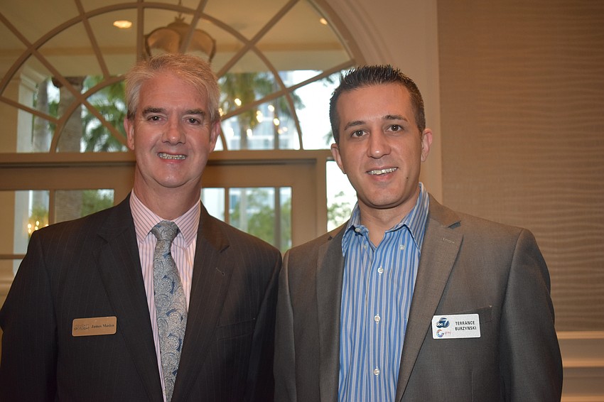 Comcast Spotlight's James Masland and ABC7's Terrance Burzynski