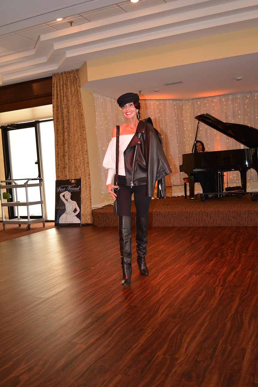 Palm Aire Women's Club member Katherine Pike is the first model to show off designs available at Dillard's.