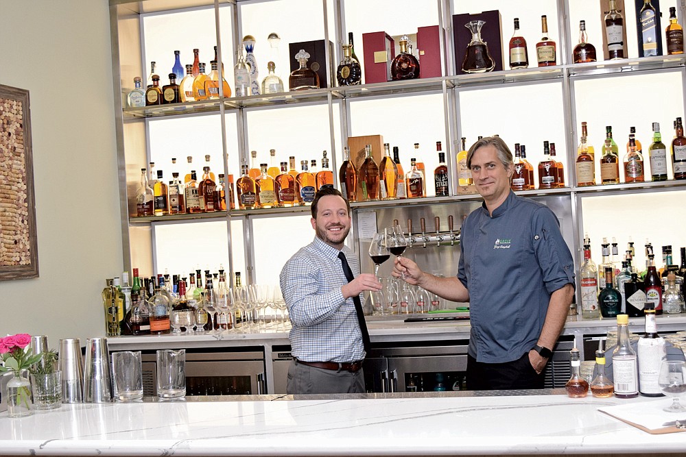 Executive Chef Greg Campbell (right) and General Manager Austin Harlow behind the newly added service bar.