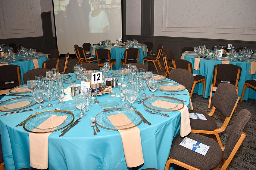 The tables were decorated with bright blue table cloths.