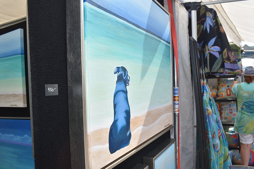 Robyn Saunders does commissioned dog portraits of your dog at the beach.