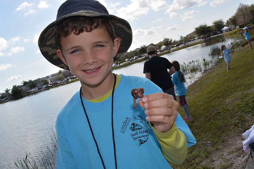 Lakewood Ranch's Sebastian Galliano, 5, hooks his own worm.