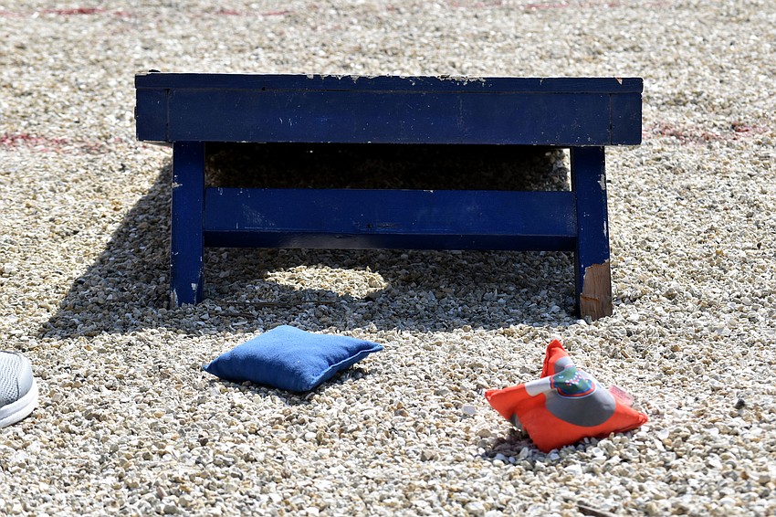 Corn hole was just one of the many games participants could try during the Village Olympics.