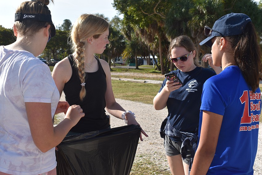 The groups had to record the pieces of trash they picked up.