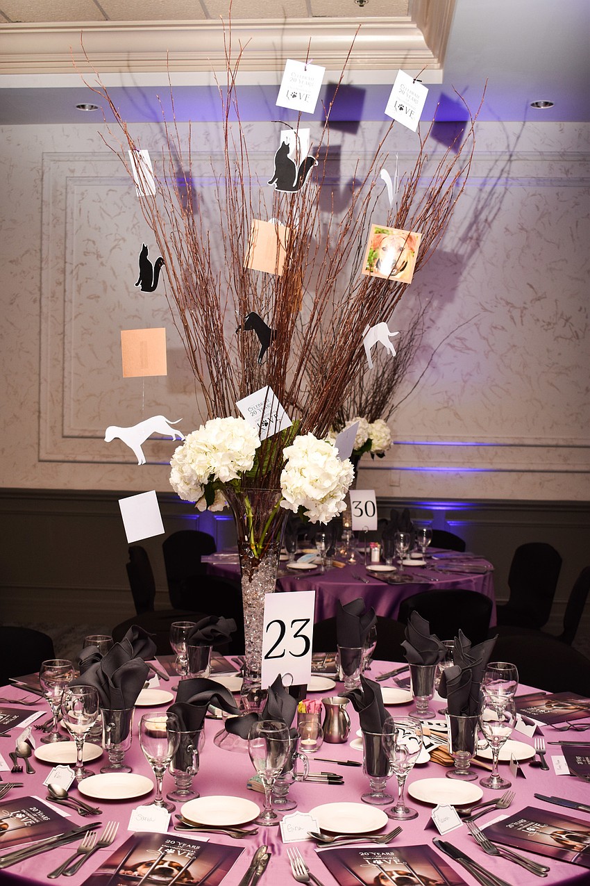 The centerpieces stood tall above the ballroom.