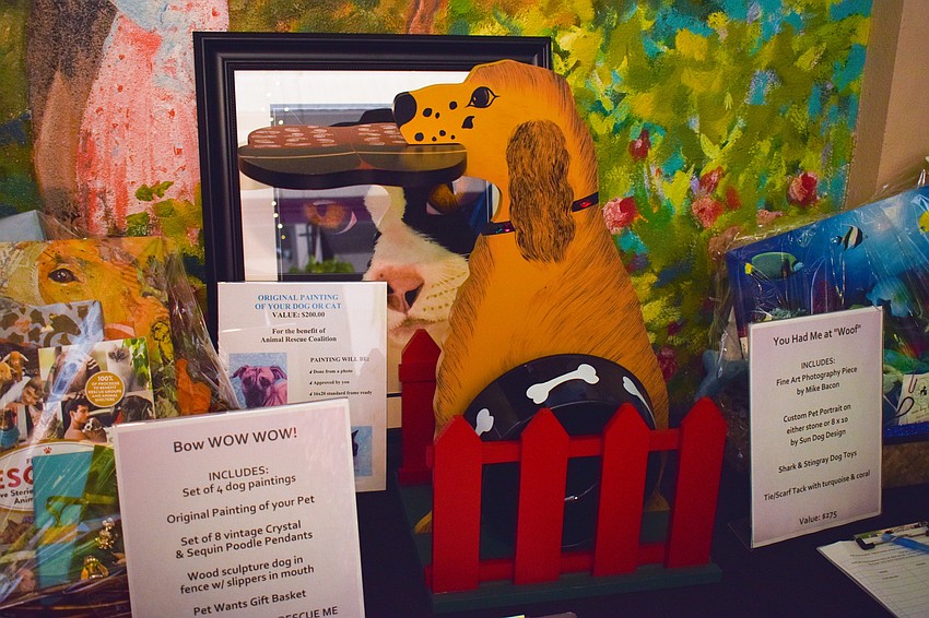 The silent auction items lined against the back wall of the atrium.