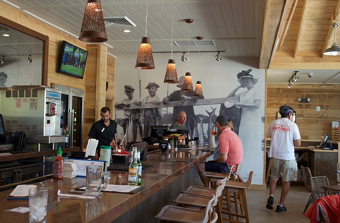 The expanded bar area is a mix of copper and wood.