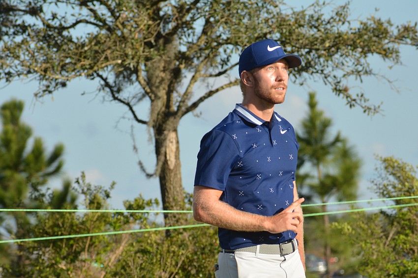 Jimmy Stanger looks and points upward after sinking an eagle on the 17th hole of the LECOM Suncoast Classic's final day, at Lakewood National.