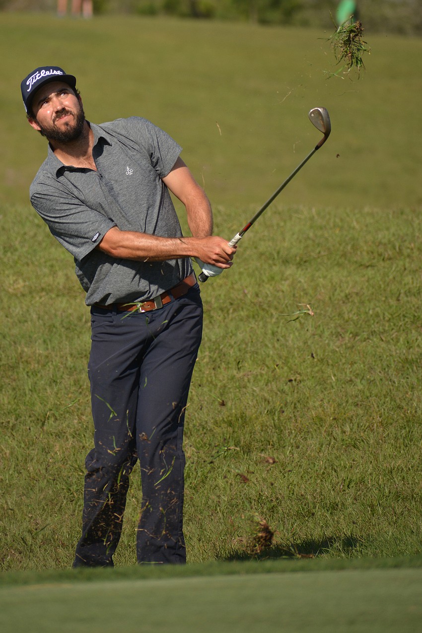 Mark Hubbard watches both his ball and the grass fly on the 10th hole during the LECOM Suncoast Classic's final day.