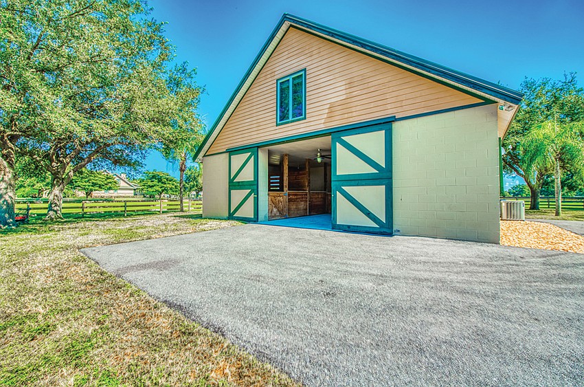 The exterior of the eight-stall barn.