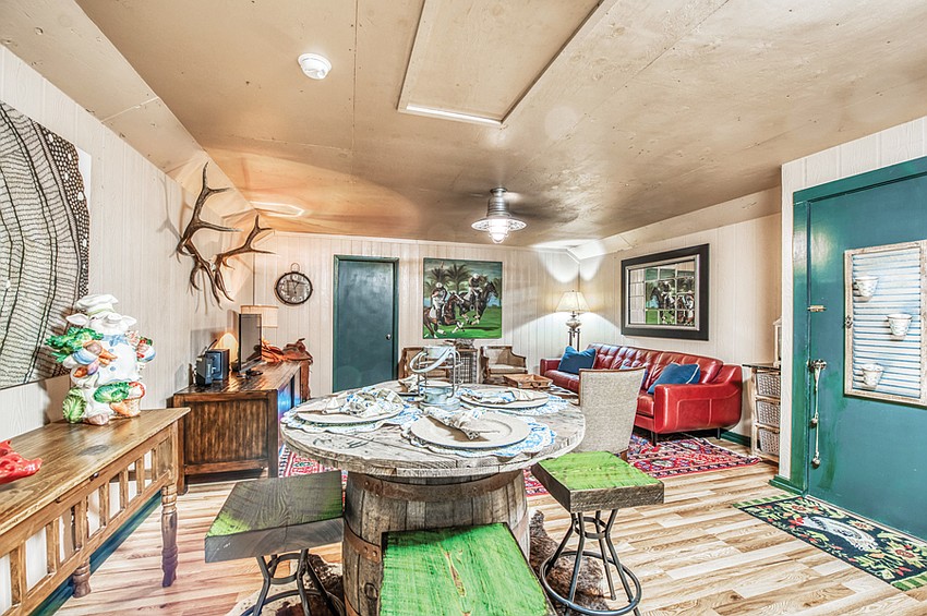 The living room-dining area of the barn apartment