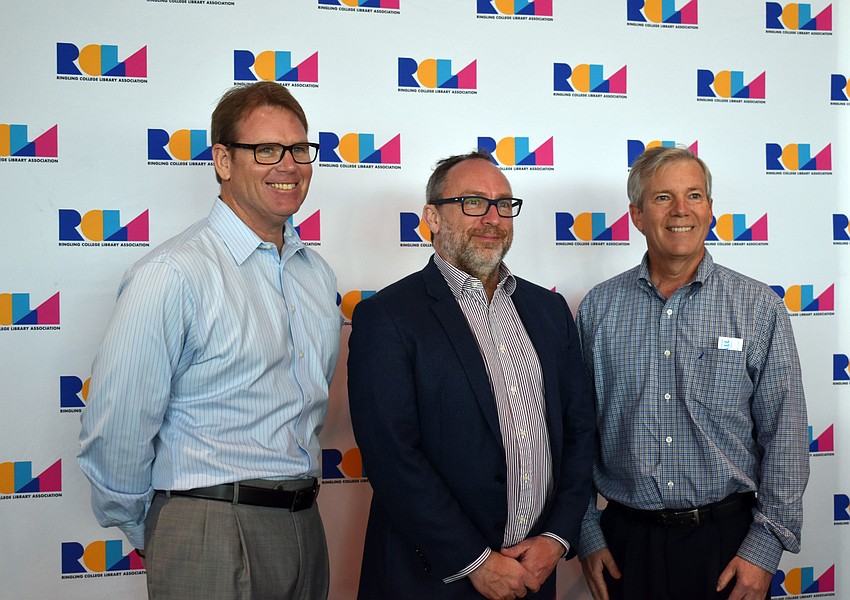 John LaCivita, executive vice president of Willis Smith Construction, Jimmy Wales and David Sessions, president and CEO of Willis Smith Construction.