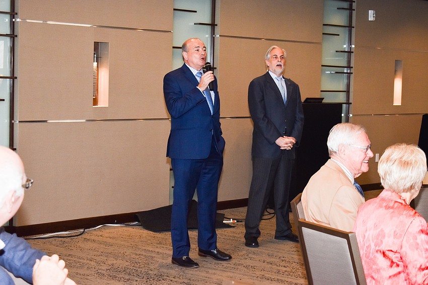 Executive Richard Russell addresses the audience.