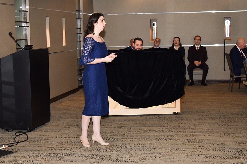 The studio artists perform for guests.