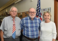 Dale Hooey, the Rev. Michael Durning and Sandy Wood