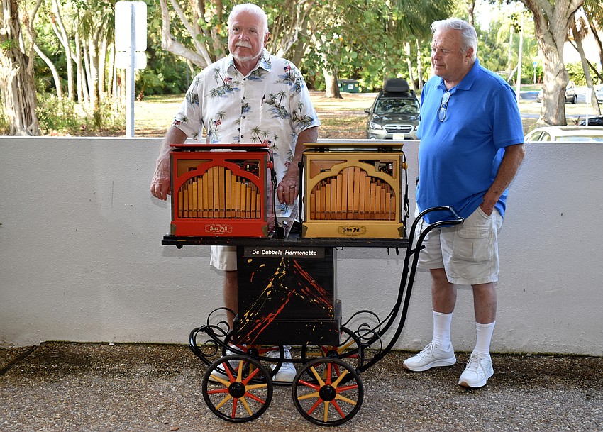 Ron Bopp ad Paul Leninger stand with Bopp’s organ set.
