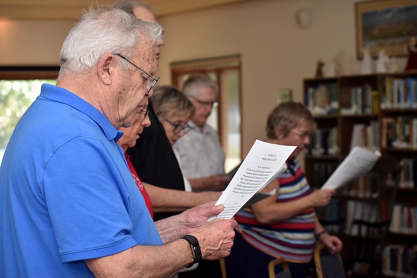 Paul Leninger sings along to “O, Canada.”