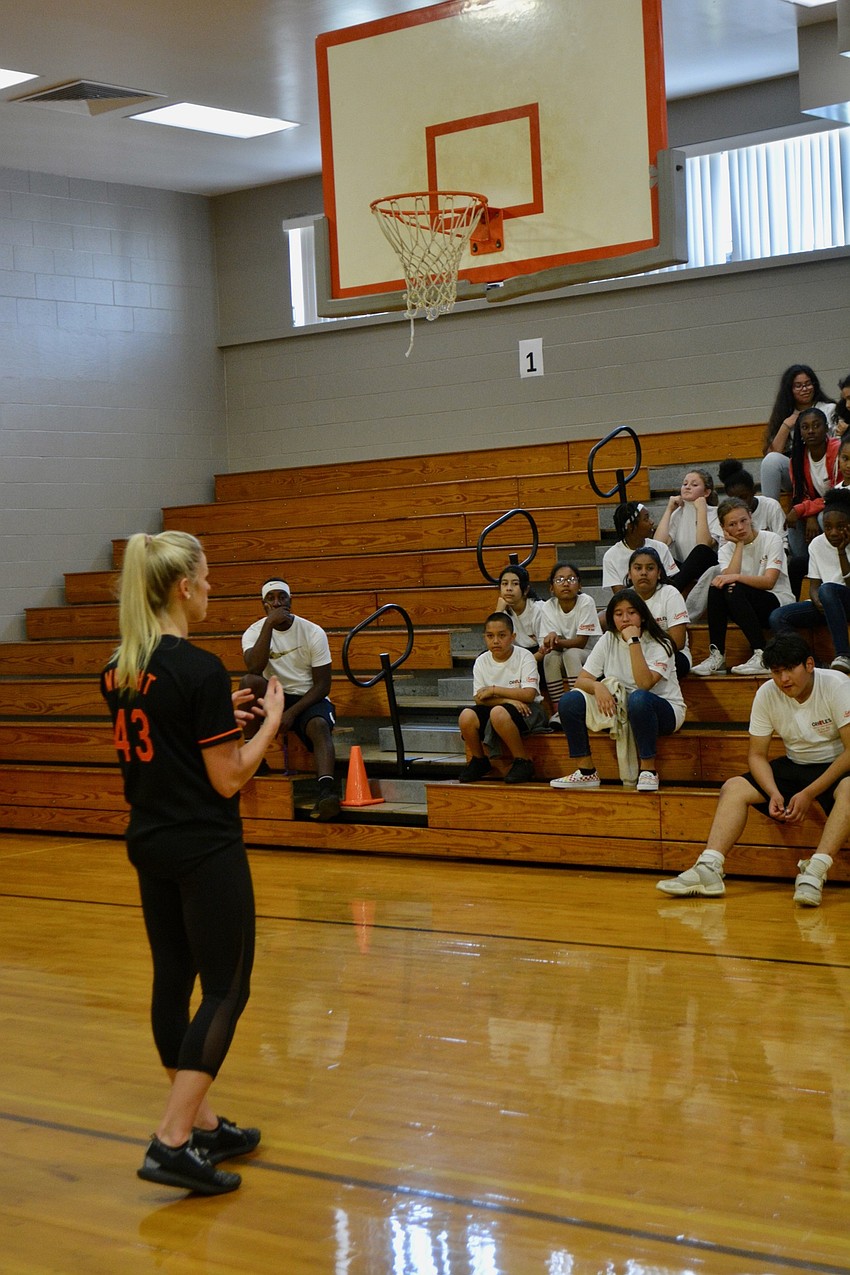 Madison Wright, a personal trainer and registered dietician, talked about healthy eating with Booker Middle students.
