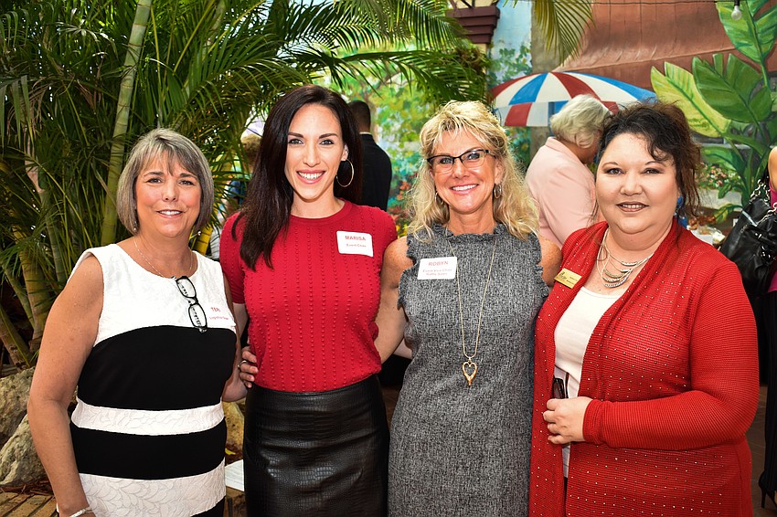 Teri Andrews, Co-Chairwomen Marisa Merlino and Robyn Didelot and Barbara Cruz