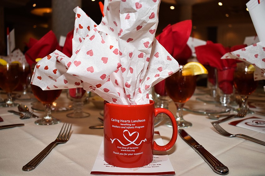 Each guest received a Caring Hearts Luncheon coffee mug.