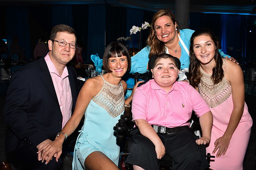 Nick, Jennifer, Grayson and Emma Tullio with (back) Regional Director Rebecca Blitz