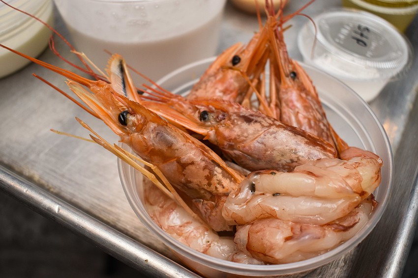 The first course featured coconut scallops and prawns.