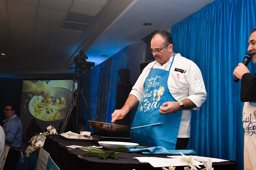 Executive Chef Jamil Piñeda shows guests how to prepare their dishes.